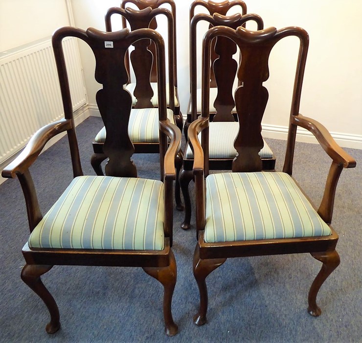 A set of six (4 + 2) Queen Anne style walnut dining chairs with cabriole legs