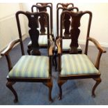 A set of six (4 + 2) Queen Anne style walnut dining chairs with cabriole legs