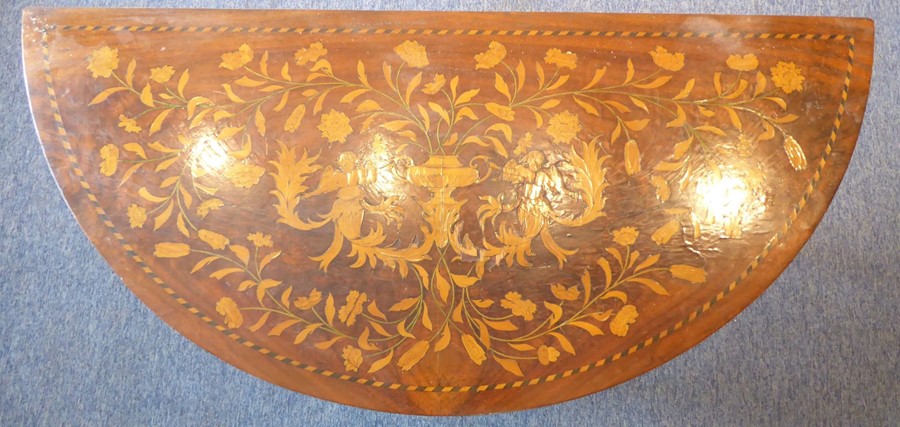 A late 19th / early 20th century demi-lune walnut and boxwood marquetry side table; raised on square - Image 2 of 6