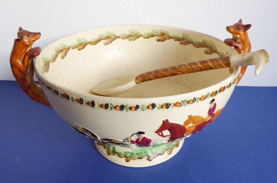 A Crown Devon (Fieldings) two-handled salad bowl; the handles as foxes (one with ear away) and