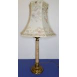A highly decorative brass and marble-effect table lamp; the hexagonal shade ornately decorated