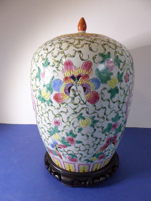 A Chinese porcelain vase of baluster form; the cover decorated with a moth and fruits and above a - Image 4 of 11