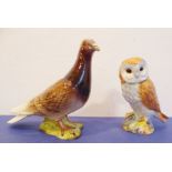 A Beswick barn owl together with a larger Beswick pigeon; the pigeon with impressed marks and