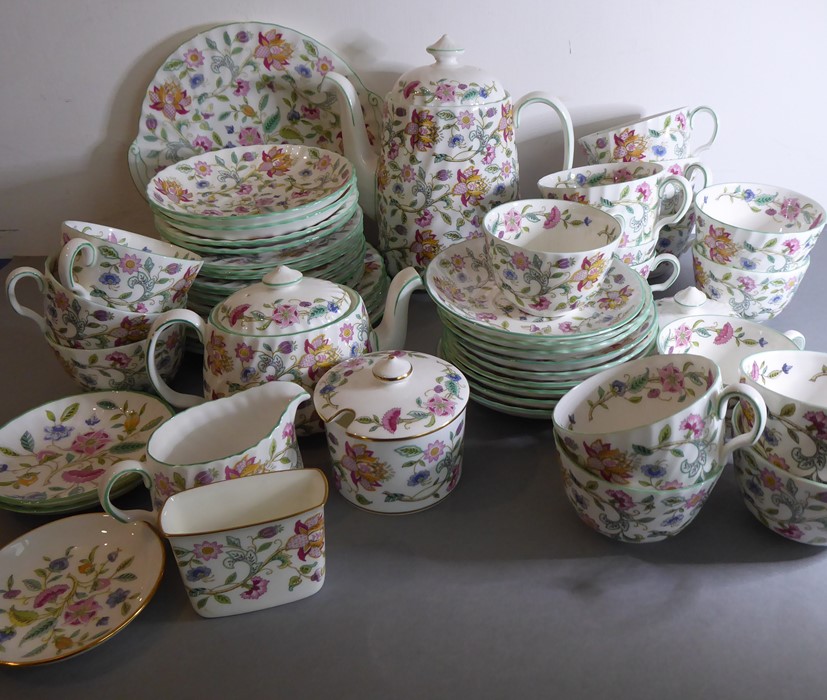 A Minton 'Haddon Hall' part tea service to include cups, saucers, teapot, coffee pot and lidded