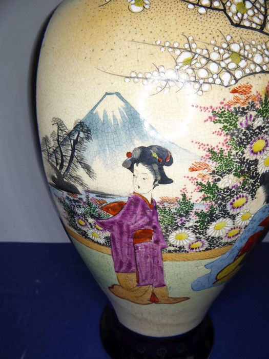 An opposing pair of early 20th century Japanese baluster-shaped pottery vases; each hand-decorated - Image 6 of 15