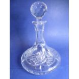 A heavy cut crystal ship's decanter and stopper (approx 26cm high including stopper)