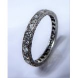 A diamond-set full-hoop eternity ring; set all round with brilliant-cut diamonds (size L/12/52)
