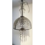 A hobnail-cut ceiling-hung chandelier; the circular chandelier bowl 25cm in diameter and with