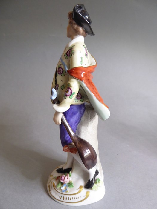 A pair of early 20th century figures: the male with outstretched right arm and lute-like instrument, - Image 4 of 26