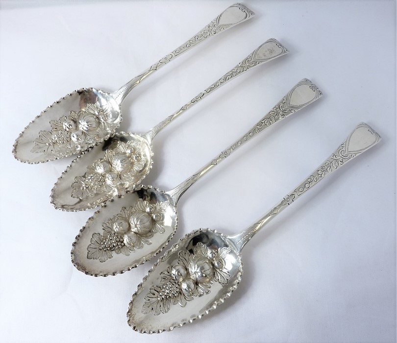 Four 18th/19th century berry spoons (later decorated) various makers and year letters (each