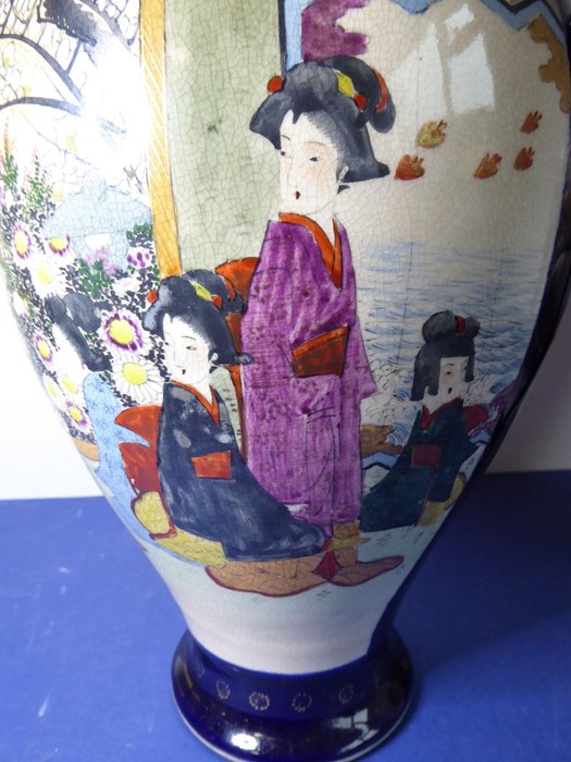 An opposing pair of early 20th century Japanese baluster-shaped pottery vases; each hand-decorated - Image 7 of 15