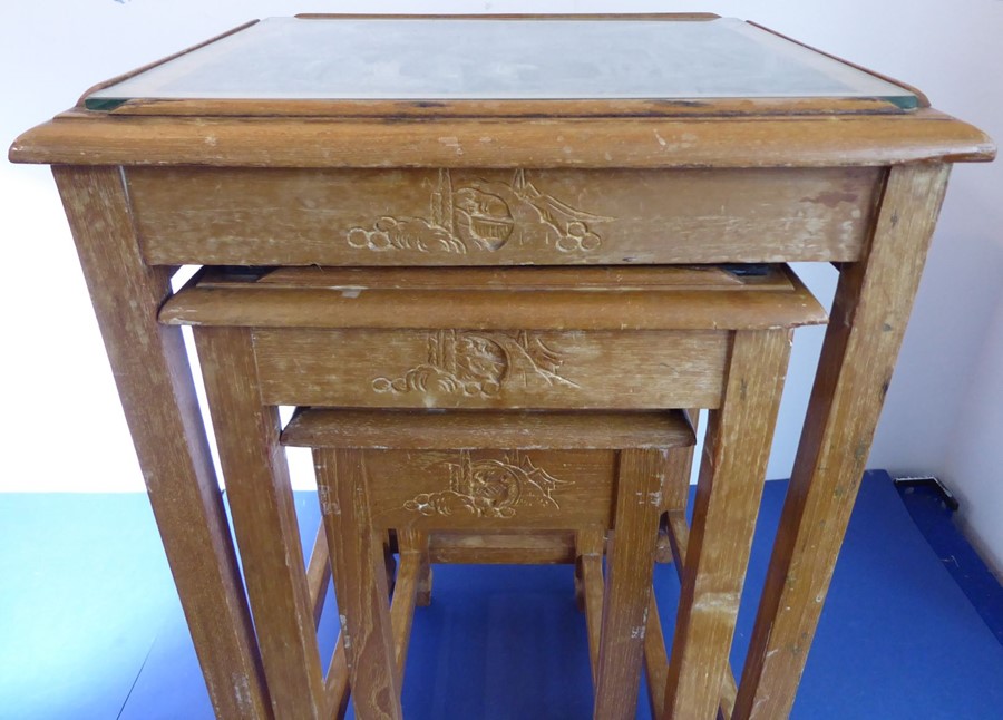 A nest of three Chinese hardwood tables; each top carved with Chinese figures and buildings and - Image 2 of 7