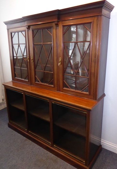 An early 20th century walnut display cabinet/bookcase; the breakfront dentil cornice above three - Image 8 of 9