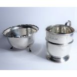 Two pieces of hallmarked silver: a small Christening tankard with high scrolling handle, marked