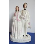 A circa 1862 Victorian Staffordshire pottery figure, 'Prince & Princess'; Alexandra of Denmark and