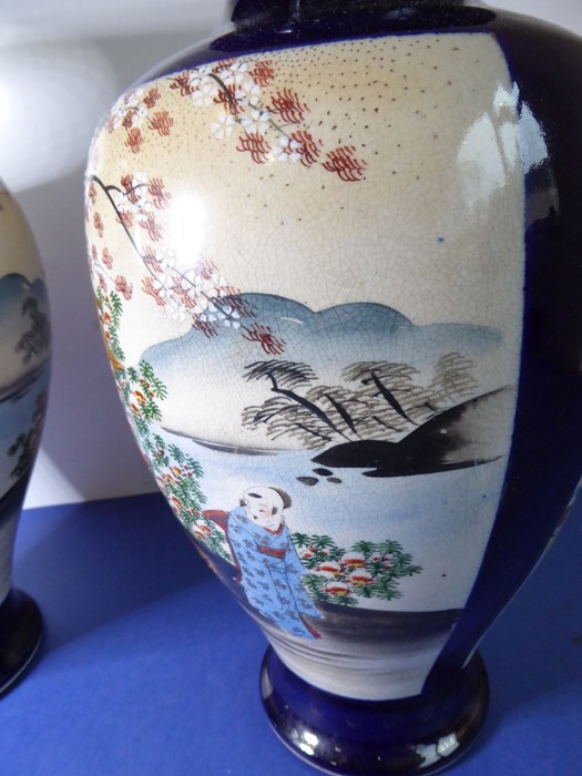 An opposing pair of early 20th century Japanese baluster-shaped pottery vases; each hand-decorated - Image 10 of 15