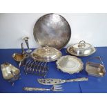 A variety of mostly 19th and early 20th century silver plate; to include a circular embossed serving