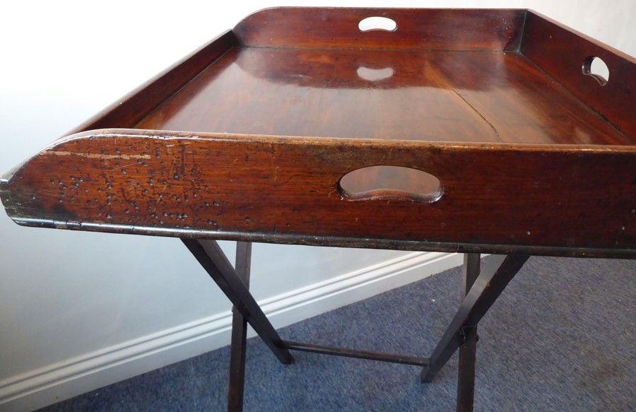 A 19th century three-handled mahogany butler's tray on stand; the folding x-frame stand with two - Image 7 of 15