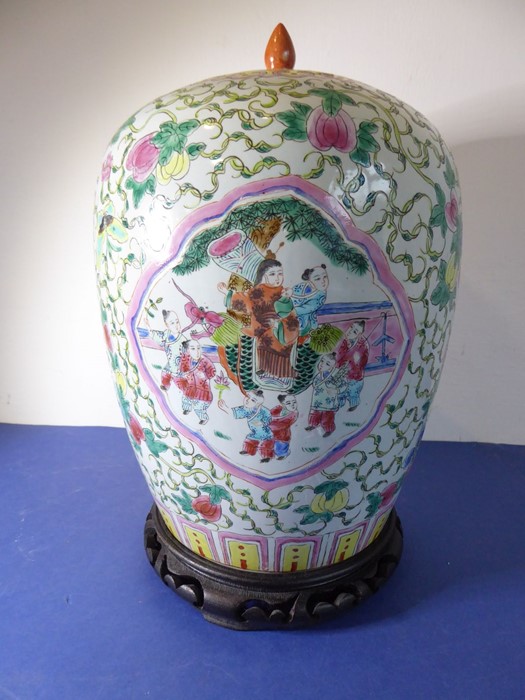 A Chinese porcelain vase of baluster form; the cover decorated with a moth and fruits and above a - Image 3 of 11