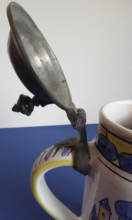 An early 19th century German faience stein and cover; decorated with a picture of a man on a rearing - Image 9 of 10