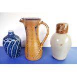 An interesting group of three studio stoneware small forms: the largest a slender Toff Milway jug (