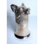 A silver-plated stirrup cup in the form of a fox's head (12cm high)