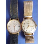 Two gentleman's Longines wristwatches; the first a 9-carat yellow-gold-cased dress wristwatch with