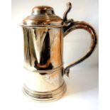 An 18th century Sheffield plated tankard; dome-topped lid and turned wooden underside base