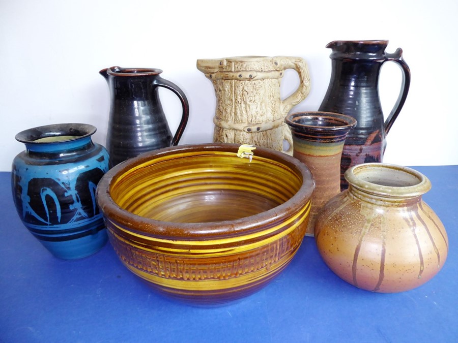 Seven studio and other stonewares: three large jugs, the tallest (31cm) by Ivan Martin at Cricklade;