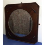 A 1920s/1930s oak-framed circular wallhanging looking glass with bevelled plate; the frame with