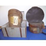 Three hat boxes and a small two-handled wooden-sided travel trunk; original shipping labels pasted