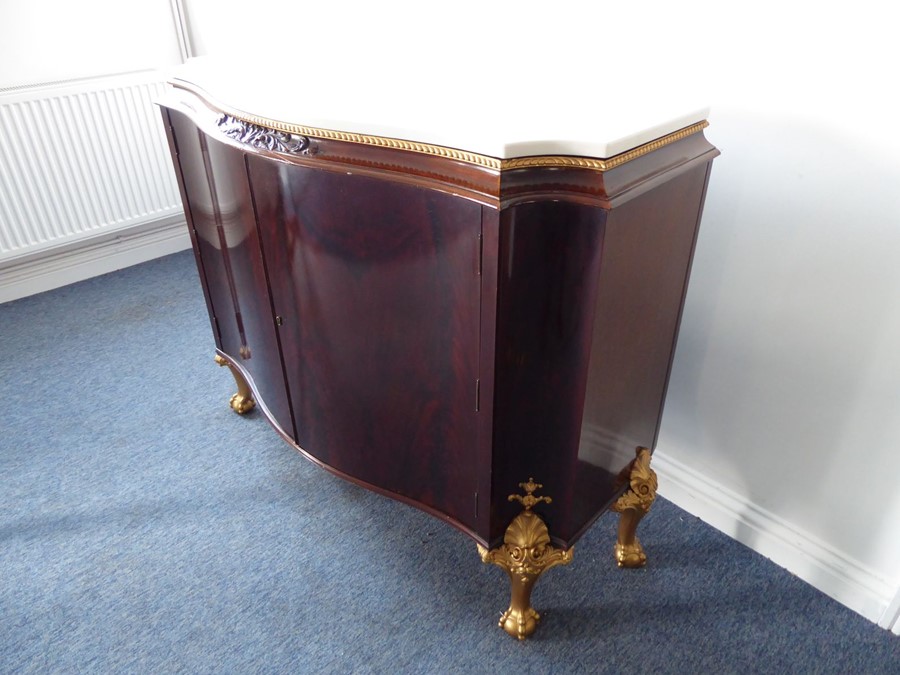 A fine early 20th century serpentine-fronted mahogany side cabinet in 18th century-style; white