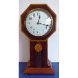 A good Edwardian period mahogany and satinwood cross-banded mantle clock having cream enamel dial