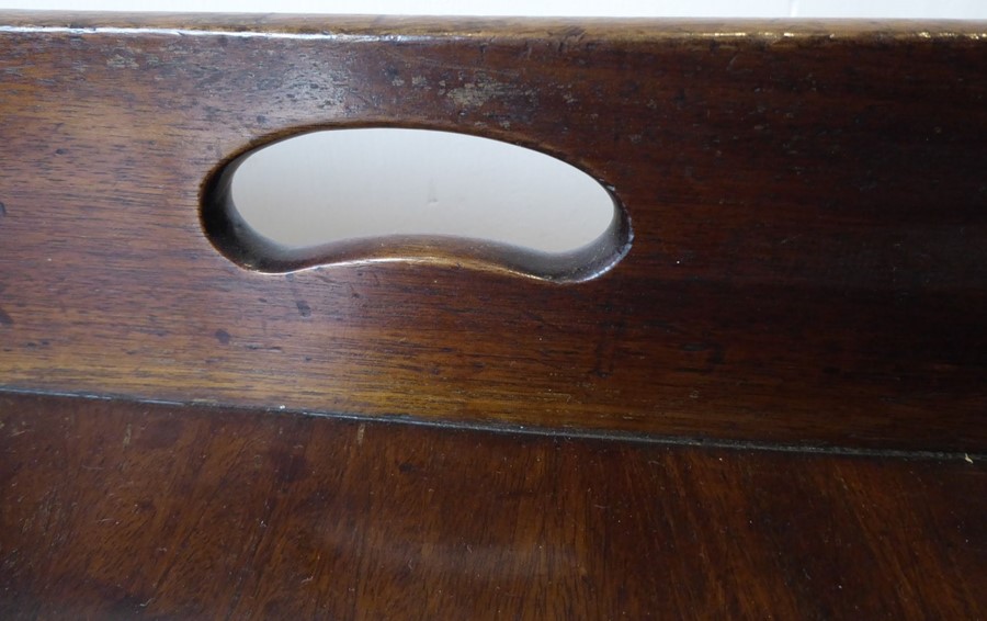 A 19th century three-handled mahogany butler's tray on stand; the folding x-frame stand with two - Image 3 of 15