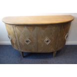 A modern bow-fronted designer sideboard with gilt style decoration; two bow-fronted end cupboard