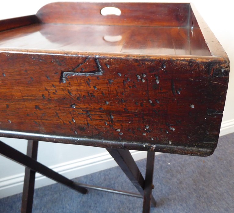 A 19th century three-handled mahogany butler's tray on stand; the folding x-frame stand with two - Image 8 of 15