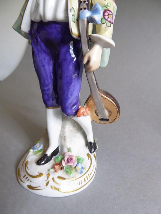 A pair of early 20th century figures: the male with outstretched right arm and lute-like instrument, - Image 3 of 26