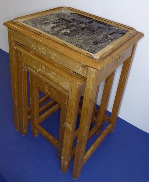 A nest of three Chinese hardwood tables; each top carved with Chinese figures and buildings and - Image 4 of 7