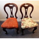 A good pair of solid and heavy mid-19th century mahogany salon chairs; balloon-style backs, stuff-