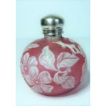 A 19th century cameo glass perfume bottle by Thomas Webb of Stourbridge; heavy white floral