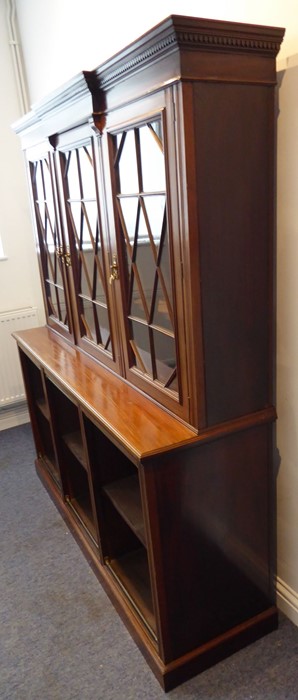 An early 20th century walnut display cabinet/bookcase; the breakfront dentil cornice above three - Image 2 of 9