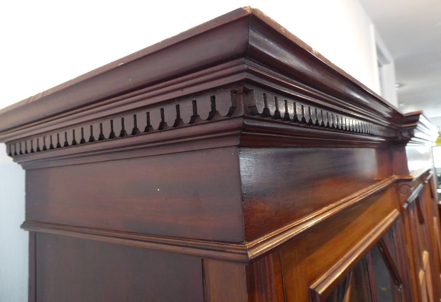 An early 20th century walnut display cabinet/bookcase; the breakfront dentil cornice above three - Image 5 of 9