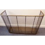 A large late 19th century brass-mounted wire-mesh fireguard (99cm wide x 70cm high)