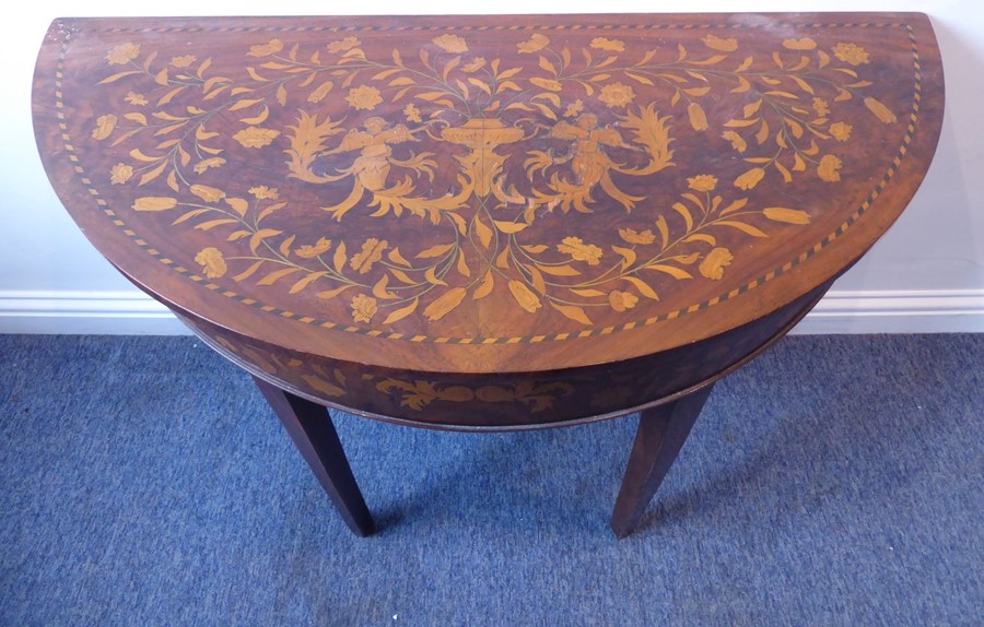 A late 19th / early 20th century demi-lune walnut and boxwood marquetry side table; raised on square - Image 3 of 6