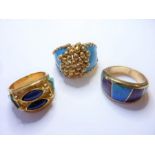 Three dress rings; the first 9-carat yellow gold with applied spherical decoration and turquoise