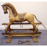 A small carved wood rocking horse for restoration; well-executed body with detailed carving to the