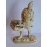 A very finely carved Japanese Meiji period ivory carving depicting a male figure holding a woven