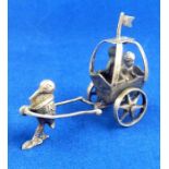 An antique silver miniature sedan chair (The cost of UK postage via Royal Mail Special Delivery