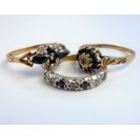 Three sapphire and diamond hallmarked 9-carat yellow-gold rings; one designed as a cluster, size