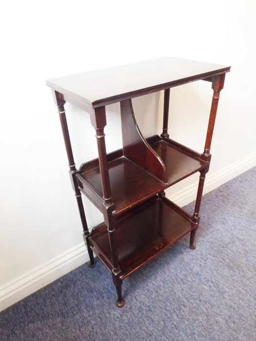 A good late 19th/early 20th century mahogany bookstand in 18th century-style; the flame-mahogany top